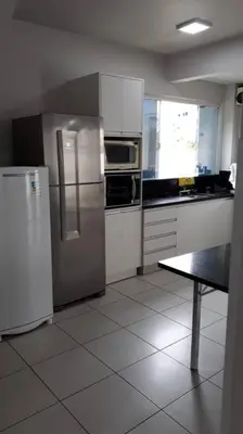 A cozinha ou kitchenette de minhacasapraiapalmas istag 4 suítes 30 hosp a combinar