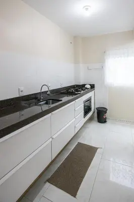A cozinha ou kitchenette de 104 Suíte com blackout • 5 hóspedes