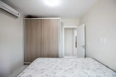 Uma cama ou camas num quarto em 104 Suíte com blackout • 5 hóspedes
