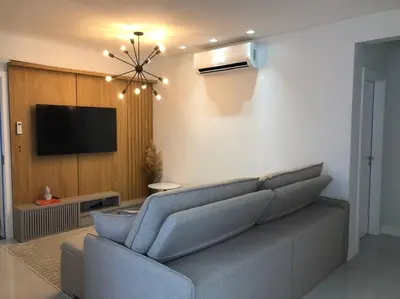 Uma televisão e/ou sistema de entretenimento em Apartamento para sua estadia em Porto Belo -SC