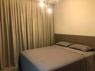 Uma cama ou camas num quarto em Apartamento para sua estadia em Porto Belo -SC