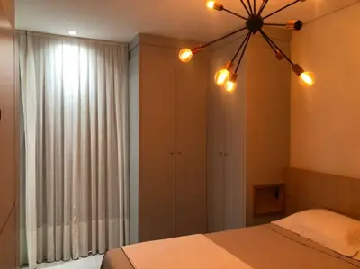 Uma cama ou camas num quarto em Apartamento para sua estadia em Porto Belo -SC