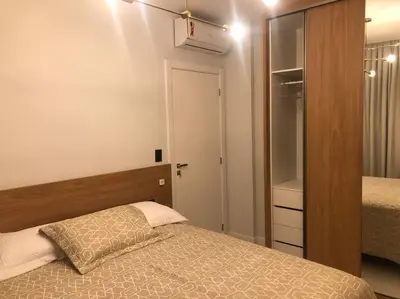 Uma cama ou camas num quarto em Apartamento para sua estadia em Porto Belo -SC