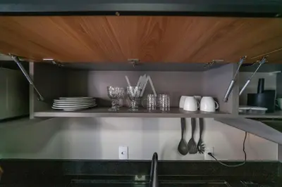 A cozinha ou kitchenette de 501- Apart com piscina vista ao mar em Bombas