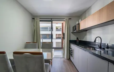 A cozinha ou kitchenette de 501- Apart com piscina vista ao mar em Bombas