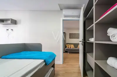 Uma cama ou camas num quarto em 501- Apart com piscina vista ao mar em Bombas