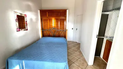 Uma cama ou camas num quarto em Casa Santorini - Vista Panorâmica - PISCINA AQUECIDA