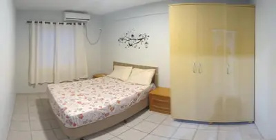 Uma cama ou camas num quarto em Edificio Daniela Ap 102