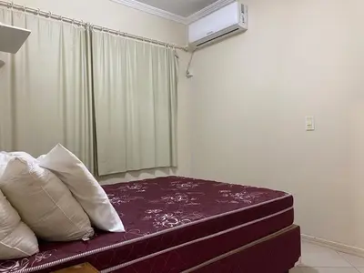 Uma cama ou camas num quarto em B188 Apto 1 quarto na praia de Bombas perto do mar
