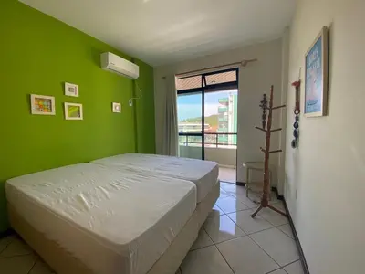 Uma cama ou camas num quarto em B106 - Apartamento de 2 quartos com vista mar