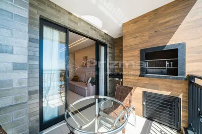 A cozinha ou kitchenette de 402 Bl 02 Waldgarten Bombinhas - 50 m do Mar e Frente Avenida - Condomínio de Alto Padrão - Piscina - Academia - Salão de jogos