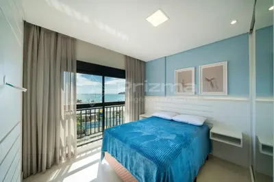 Uma cama ou camas num quarto em 402 Bl 02 Waldgarten Bombinhas - 50 m do Mar e Frente Avenida - Condomínio de Alto Padrão - Piscina - Academia - Salão de jogos