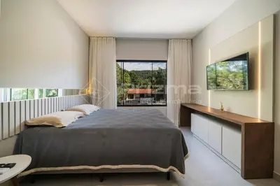 Uma cama ou camas num quarto em Excelente duplex geminado na Praia de Mariscal.
