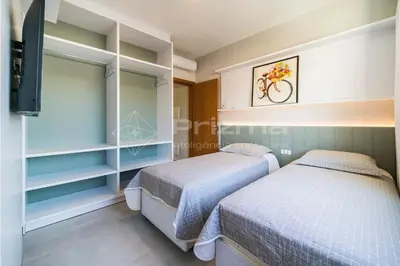 Uma cama ou camas num quarto em Excelente duplex geminado na Praia de Mariscal.