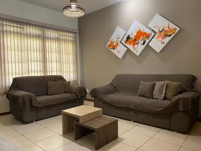 Uma área de estar em B958 - Casa de praia com 3 quartos em Bombinhas SC