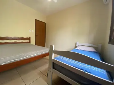 Uma cama ou camas num quarto em B958 - Casa de praia com 3 quartos em Bombinhas SC
