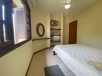 Uma cama ou camas num quarto em B958 - Casa de praia com 3 quartos em Bombinhas SC