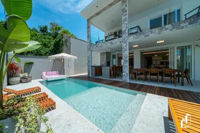 A piscina em ou perto de Casa com piscina, diversão e conforto em família