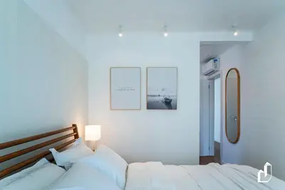 Uma cama ou camas num quarto em Casa com piscina, diversão e conforto em família