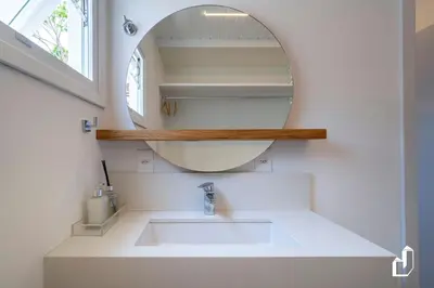 Uma casa de banho em Casa com piscina, diversão e conforto em família