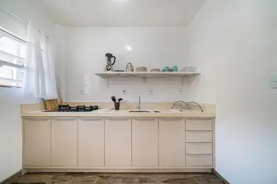 A cozinha ou kitchenette de Apartamento 3 dormitórios - 50 metros da Praia de Bombinhas
