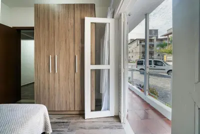 Uma cama ou camas num quarto em Apartamento 3 dormitórios - 50 metros da Praia de Bombinhas