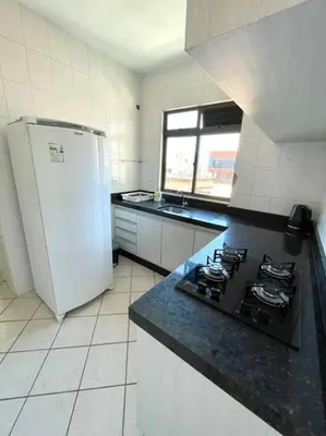 A cozinha ou kitchenette de Apto com ótima localização, centro de Meia Praia