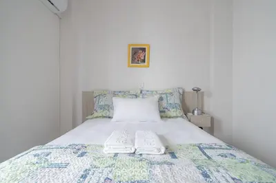 Uma cama ou camas num quarto em Apto 3Q à beira-mar c/ churrasqueira RSL0502