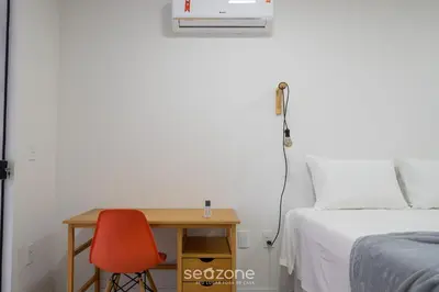 Uma cama ou camas num quarto em Belo apto com churrasqueira 100m da praia BLN0802