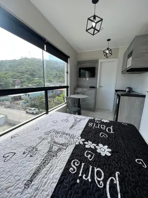 Uma cama ou camas num quarto em Residencial YÜMA
