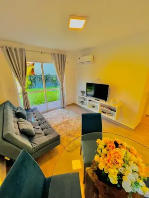 Uma televisão e/ou sistema de entretenimento em Apartamento Beija Flor Bombinhas