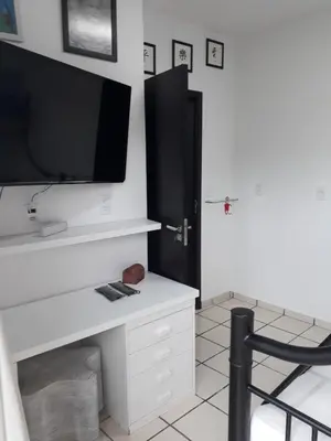A planta de Apartamento colado no mar Zimbros