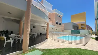 A piscina em ou perto de B915 - Apartamento 2 quartos em cond. com piscina