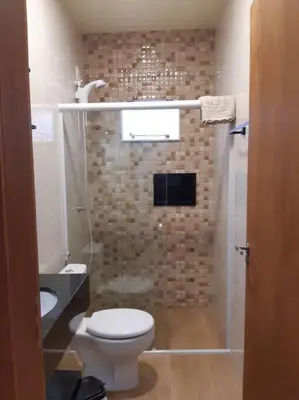 Uma casa de banho em Stúdio Natureza S/A 2