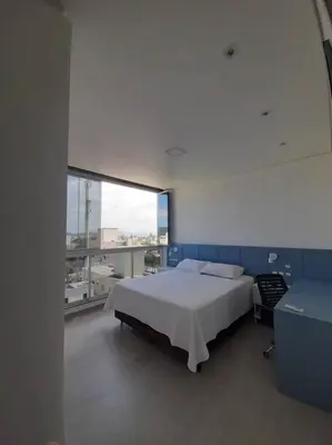 Uma cama ou camas num quarto em Cobertura Vista Mar