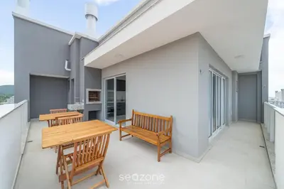 Uma varanda ou terraço em Apto c/ piscina e churrasqueira Bombinhas RNA0303