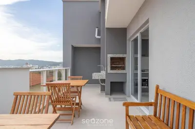Uma varanda ou terraço em Apto c/ piscina e churrasqueira Bombinhas RNA0303
