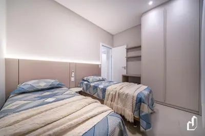 Uma cama ou camas num quarto em A pouco metros do mar com 2 dormitórios