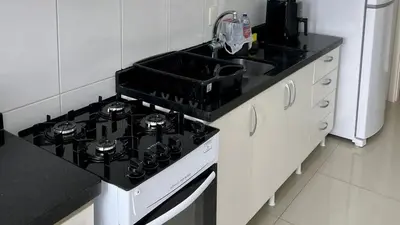 A cozinha ou kitchenette de Apto Almeida e Moraes Frente Mar Balneário Camboriú