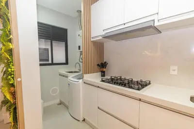 A cozinha ou kitchenette de 010A - Lindo apartamento 2 dormitórios na praia de Bombas
