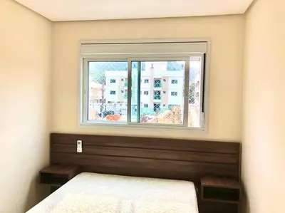 Uma cama ou camas num quarto em Apartamento novo aconchegante em Palmas / WiFi