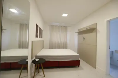 Uma cama ou camas num quarto em 3 suítes + vista mar - Le Premier