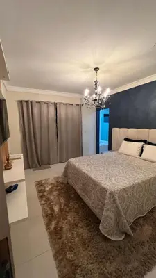 Uma cama ou camas num quarto em Residencial Cordeiro