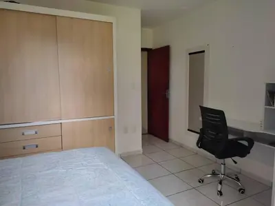 Uma cama ou camas num quarto em Praia Itapema