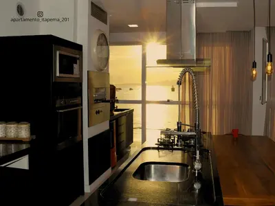 A cozinha ou kitchenette de Apto Panorâmico Vista Mar em Itapema - SC