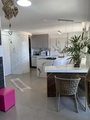 A cozinha ou kitchenette de Promoção quatro quartos Avenida Atlântica