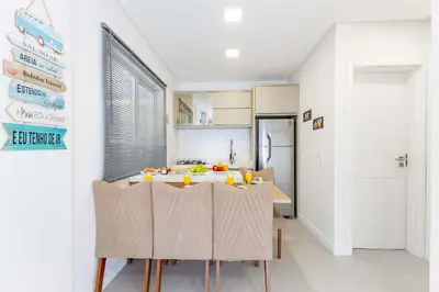 A cozinha ou kitchenette de Loft Aconchegante a Poucos Minutos da Praia de Bombinhas