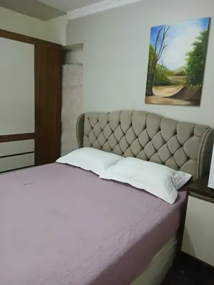 Uma cama ou camas num quarto em Suíte Aconchegante Balneário Camboriú próximo Praia