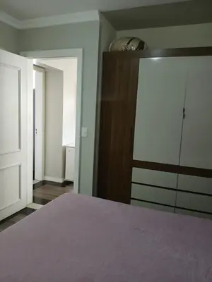 Uma cama ou camas num quarto em Suíte Aconchegante Balneário Camboriú próximo Praia