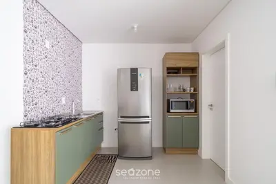 A cozinha ou kitchenette de Apto 2Q c/ churrasq. 500m da Meia Praia ROT1001